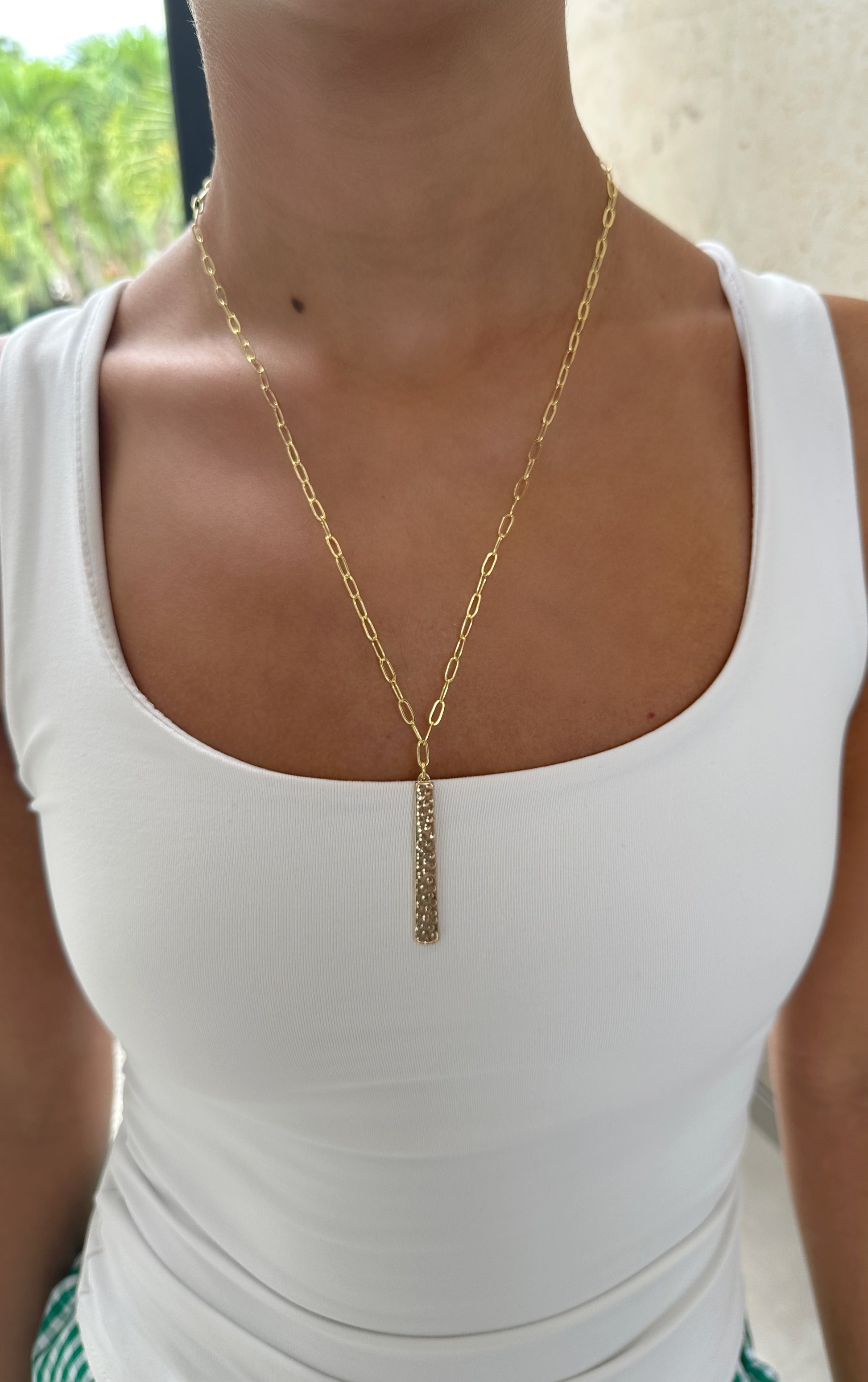 Gold long studded necklace